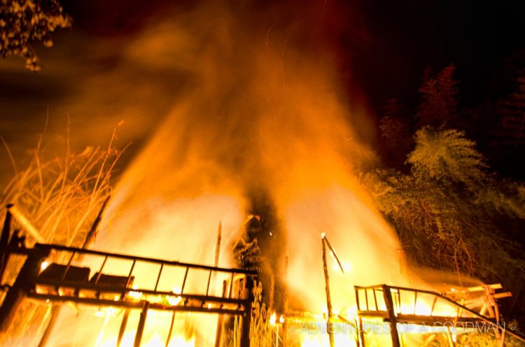 A 2 second exposure of the final two bungalows blowing smoke and flames into the sky at 3:28am