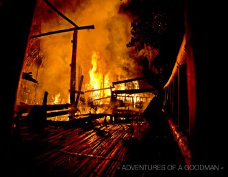 A view of the burning bungalows from the deck of the first hut to catch fire - at 3:18am