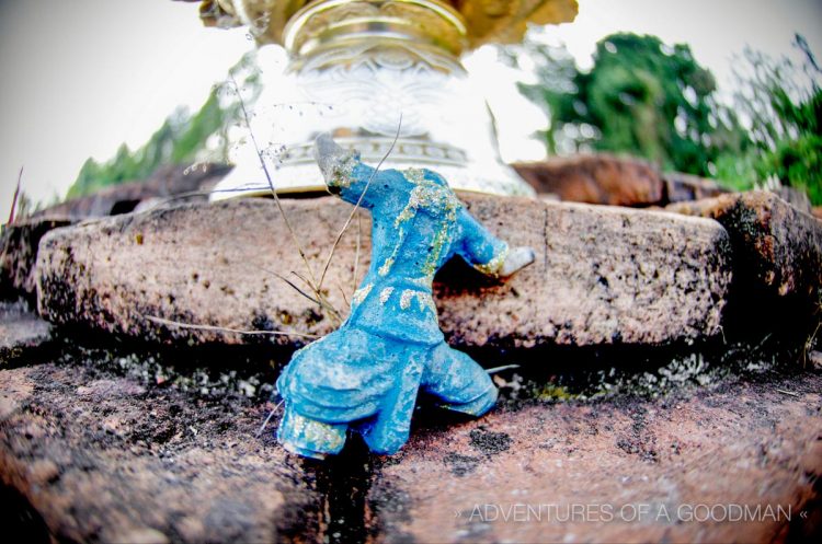 A headless statue beneath an alms bowl at the ruins of Wat Phra Chao Ong Dam - Phaya Mangrai - Wiang Kum Kam - Chiang Mai, Thailand