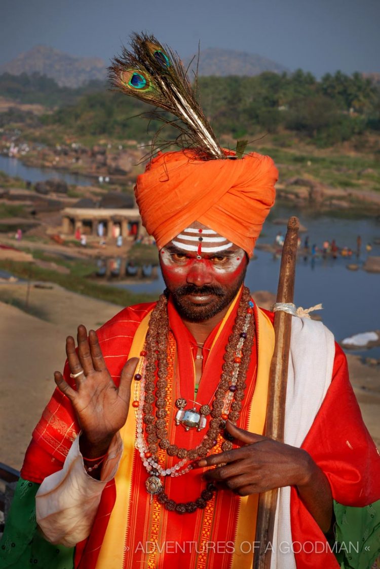 A baba on the shores of the Hampi River, posing in exchange for a tip