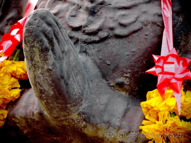 A statue in the prayer pose at Wat Chedilem in Wiang Kum Kam