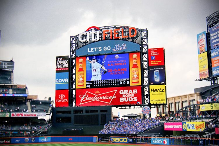 The Citi Field scoreboard in center congratulates RA Dickey on his 20th win after the last home game of the 2012 season