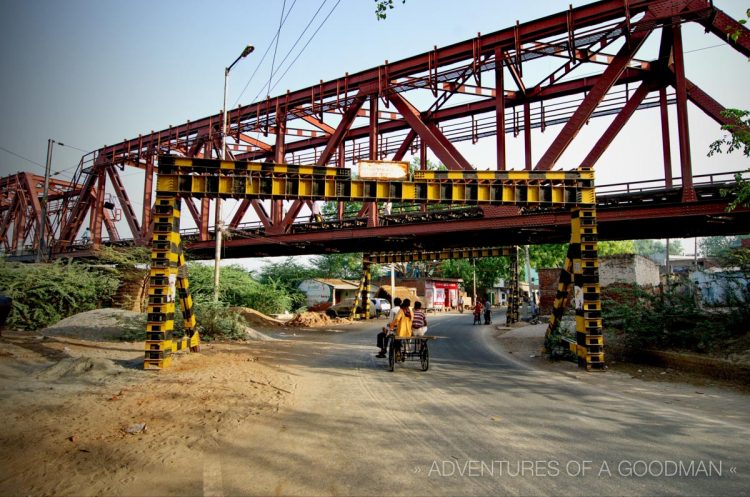 A road and bridge near the Yamuna River in Agra, India