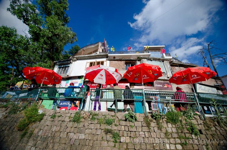 Commerce and relaxation in the main square of McLeod Ganj, India