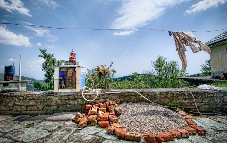 Shrines are everywhere in India: like this one below a laundry line outside a guesthouse in upper Bhagsu