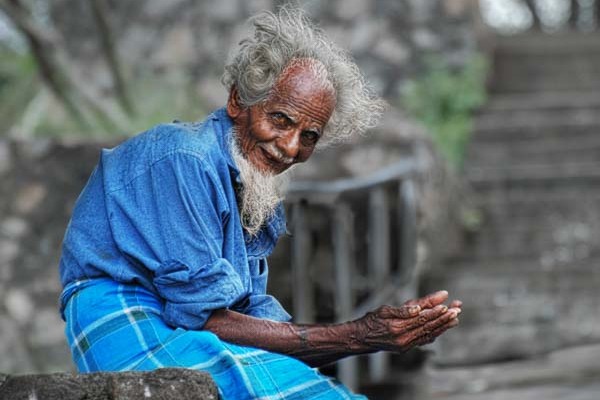 An ancient beggar at Dambulla: one of Sri Lanka's Ancient Cities