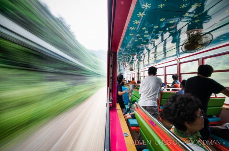 I love how this looks like two different photos placed side by side. I took it by positioning my camera half-inside and half-outside the train and leaving the shutter open for 2 seconds.