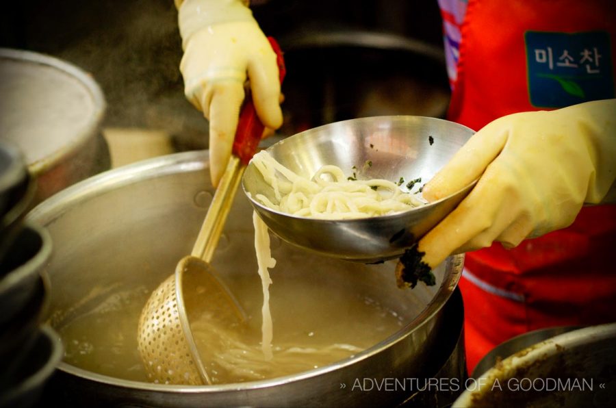 Preparing a bowl of noodle soup