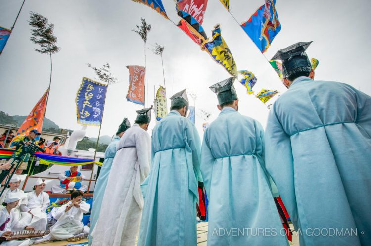 Shaman holy men line up during a Jae Sa ceremony
