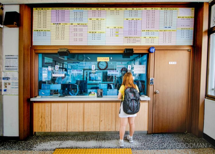 A local woman purchases a bus ticket at the Gun San bus terminal in Iksan, South Korea