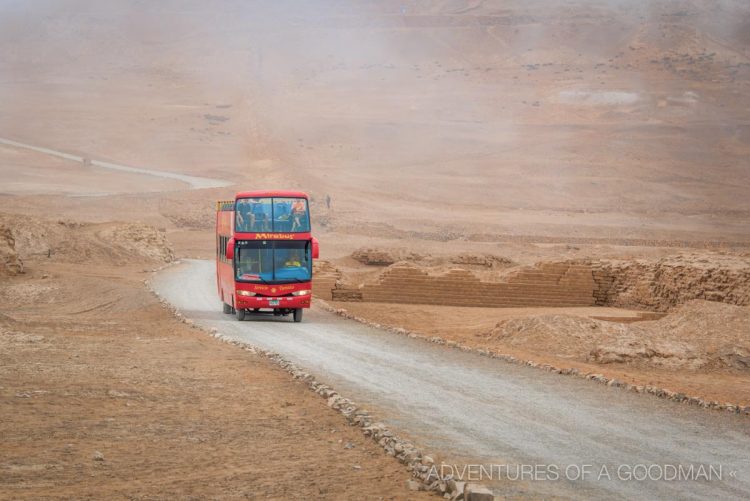 A tour bus at the Pachacamac Ruins in Lima, Peru