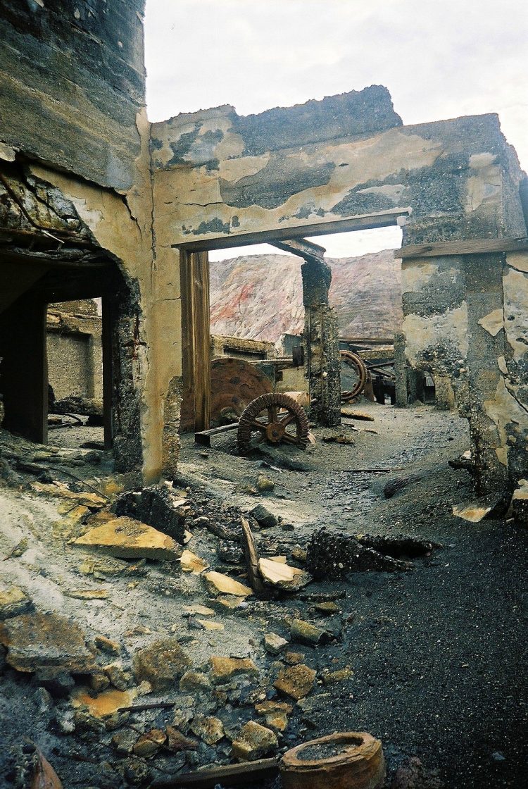 This photo is of ruined mine works on White Island - an active volcano island off the coast of New Zealand. From the 1880s through to the 1930s some hardy souls lived out here mining the sulphur for use as an antibacterial agent. The corroded ruins are testament to the tragedy of 1914 when a crater rim collapsed and the resulting lahar killed all ten workers then based on White Island. The only survivor was the cat.