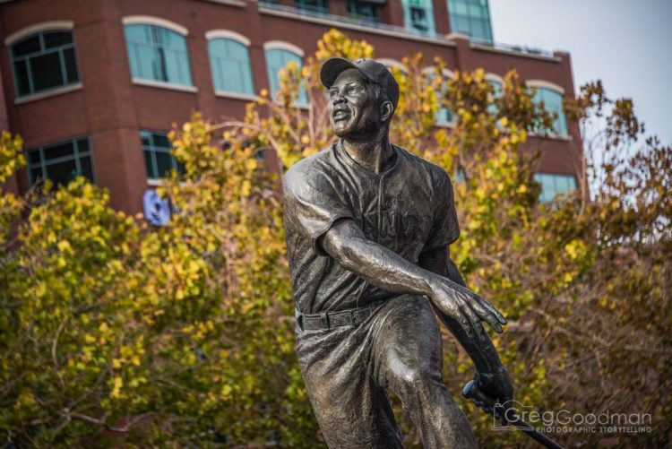 A statue of Willie Mays greets fans as the enter the main AT&T Park entrance on Third Street.