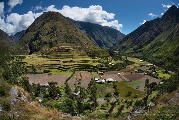 A modern-ish town sits below the Llactapata agricultural terraces.