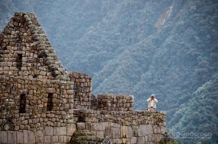 To help protect Machu Picchu, dozens of guards watch the site with binoculars.