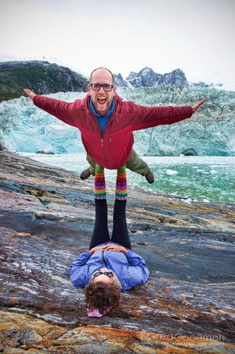 My wife, Carrie, puts me up in an Acro Yoga pose on the Pia Glacier.
