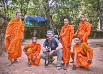 Hanging out with monks at Ta Phrom in Angkor, Cambodia