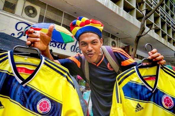 A Colombian man in Santa Marta sells team shirts during the 2014 World Cup