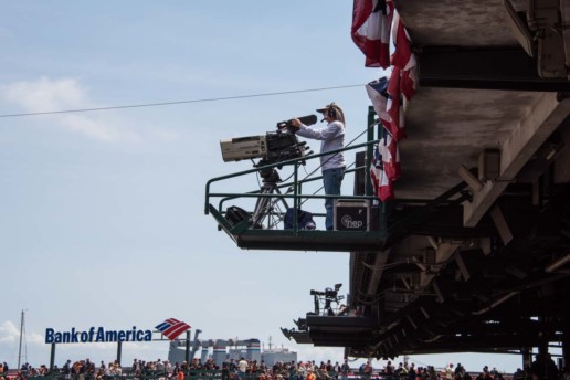 A camerawoman films Opening Day at AT&T Park