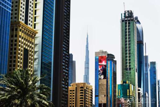 The Burj Khalifa peeks through an impressive downtown Dubai skyline