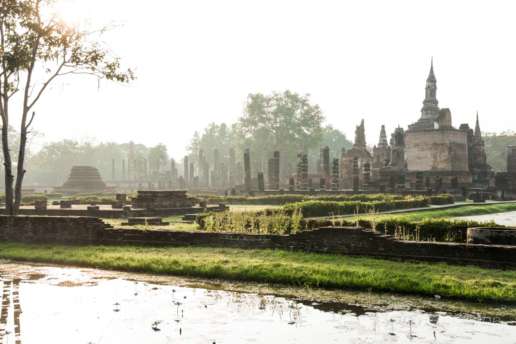 Early morning light bathes Wat Mahathat