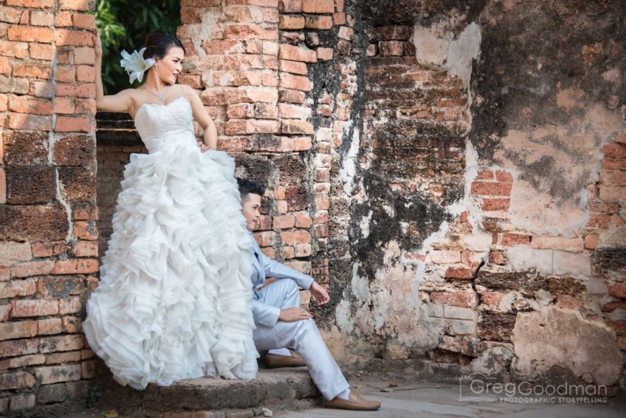 A local couple celebrates their wedding at Wat Si Sawai