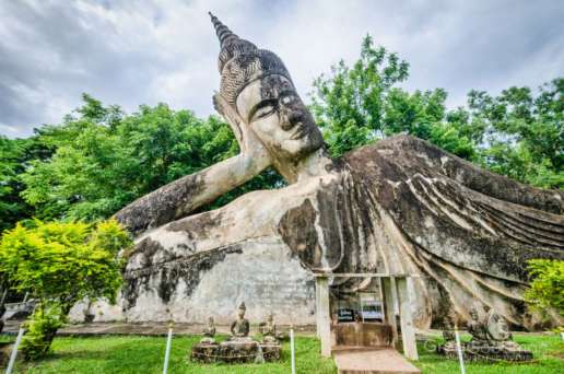 The giant reclining Buddha statue at Kiengkhuan in Vientian, Laos