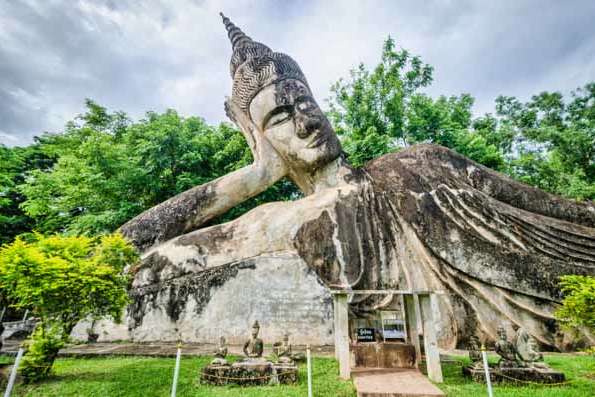 The giant reclining Buddha statue at Kiengkhuan in Vientian, Laos