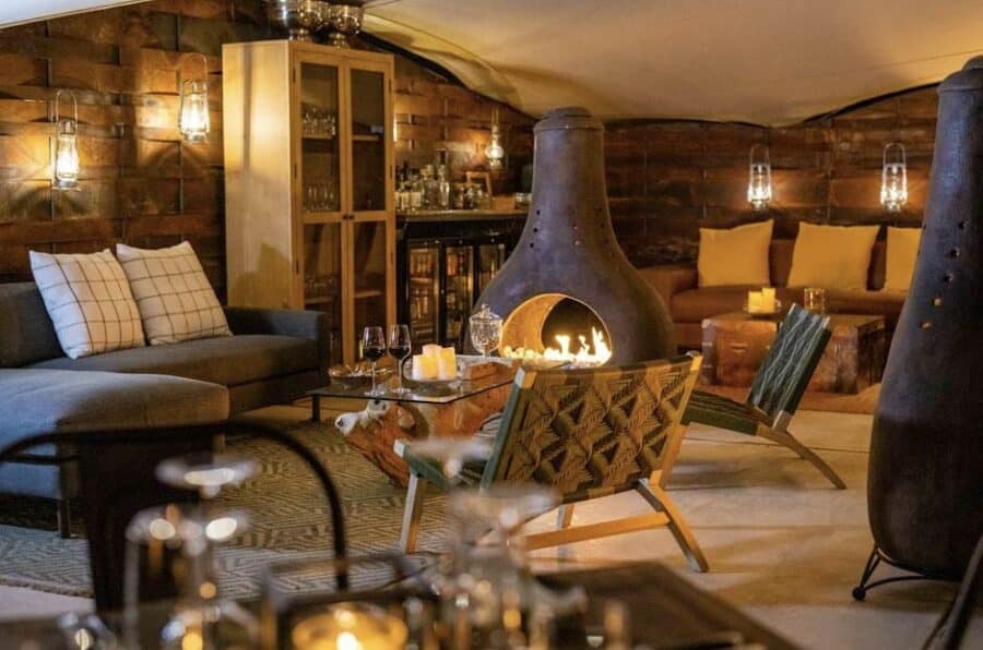 A stylish boutique lodge interior with warm lighting and natural materials